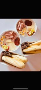 two plates of food with different types of food at Apartmány Alexander in Vrbov
