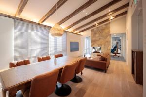 a dining room with a table and a couch at -new-SHELL THE THIRD in Kamakura