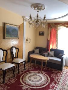 Posezení v ubytování Петрос Family Hotel
