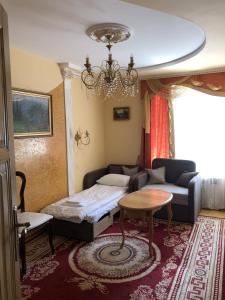 Posezení v ubytování Петрос Family Hotel