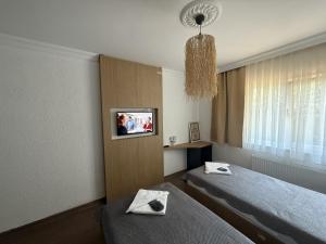 Ένα ή περισσότερα κρεβάτια σε δωμάτιο στο ALEX VİLLAGE LİFE +79 φωτογραφίες