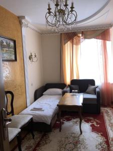 Postel nebo postele na pokoji v ubytování Петрос Family Hotel