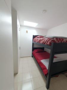 Ένα ή περισσότερα κρεβάτια σε δωμάτιο στο Nayon Residence Fasmin