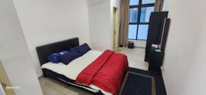 Ένα ή περισσότερα κρεβάτια σε δωμάτιο στο The vibe ATLANTIS RESIDENCES Melaka