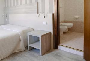 Koupelna v ubytování Hotel Miralago