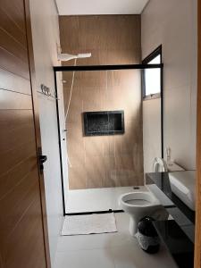 Et badeværelse på Beachfront house in Lagoinha