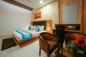 Postel nebo postele na pokoji v ubytování Hotel Grand Regency by JMD Group Near Delhi IGI Airport