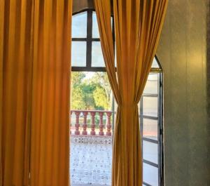 Balkón nebo terasa v ubytování Qila Hotel