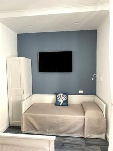 Et tv og/eller underholdning på Anzio Central Apartments