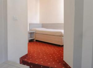 Postel nebo postele na pokoji v ubytování Hotel Miralago