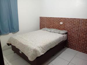 Postel nebo postele na pokoji v ubytování Sobrado com piscina em Caioba