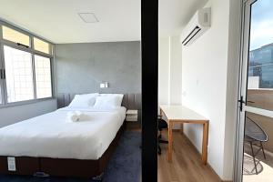 Postel nebo postele na pokoji v ubytování Linda cobertura com vista