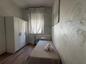 Postel nebo postele na pokoji v ubytování Hotel Eriale Nuova Gestione