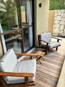 Et opholdsområde på Casa Xunan - Beautiful 1 Bedroom Apartment with pool