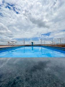 Πισίνα στο ή κοντά στο Hotel Tropical Paracatu Ereli