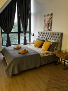 Llit o llits en una habitació de Apartman Yellow Moon