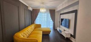 TV a/nebo společenská místnost v ubytování Exquisite Prima