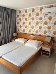 Postel nebo postele na pokoji v ubytování Apartman Melassy