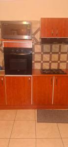 Kuchyň nebo kuchyňský kout v ubytování Chikusi Residence