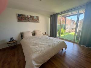 Posteľ alebo postele v izbe v ubytovaní Sous le soleil de Martigues