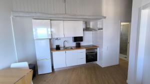 Dapur atau dapur kecil di Consolação Sea View +4 gambar