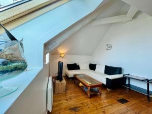 Et opholdsområde på La Petite Cachette de Grandcamp - Seafront view