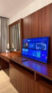 TV a/nebo společenská místnost v ubytování شقه ملينيوم ملك