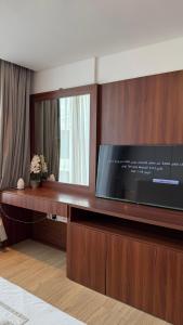 TV a/nebo společenská místnost v ubytování شقه ملينيوم ملك