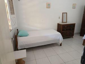 Postel nebo postele na pokoji v ubytování Recanto do Cajueiro, Sua casa de praia