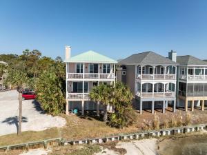 an aerial view of a large house on the beach at 12 Sea Mist in Fripp Island