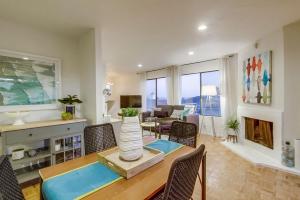 a living room with a vase on a table at Beryl Bungalow in San Diego