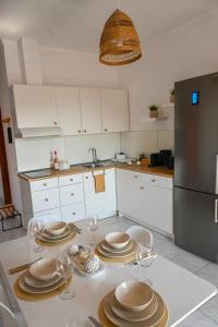 Kuchyň nebo kuchyňský kout v ubytování Bohemian Afitos Apartment