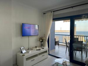 Un televizor și/sau centru de divertisment la Luxe appartement 20 - Punta Glea