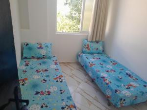 Una cama o camas en una habitación de complexe MIXTA SAFIA BLOCK 7 ETG 2 APRT 40 MARTIL