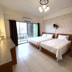 Ένα ή περισσότερα κρεβάτια σε δωμάτιο στο the stay bangsaen