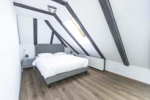 Postel nebo postele na pokoji v ubytování Hotel de France