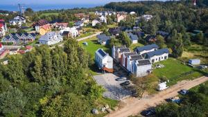 an aerial view of a small town with houses at Na Pokładzie e-apart in Jastrzębia Góra