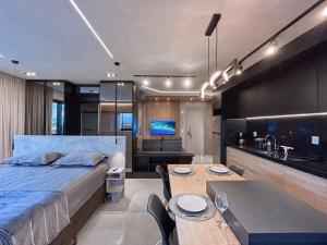 Katil atau katil-katil dalam bilik di Apartamento Luxuoso no 8º andar Prédio Vertigo