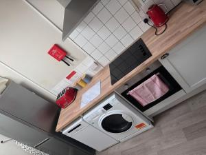 O bucătărie sau chicinetă la The Bell Hotel Cottages +8 fotografii