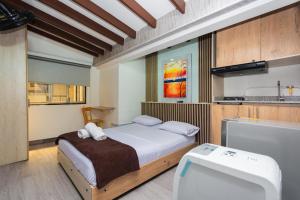 Postel nebo postele na pokoji v ubytování Hotel Lares 70 Laureles