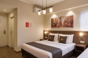 Postel nebo postele na pokoji v ubytování bugrashov 13 room