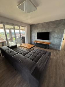 TV a/nebo společenská místnost v ubytování Penthouse - Kosmonautů Street