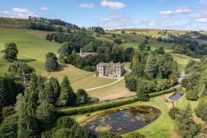 an aerial view of a mansion in a green field at The Hutton Suite in Marske