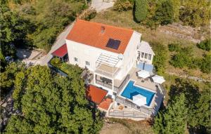 an overhead view of a large white house with an orange roof at Stunning Home In Mlini in Mlini +21 photos