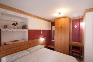 Postel nebo postele na pokoji v ubytování Residence Arvinei