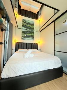 Postel nebo postele na pokoji v ubytování 446 Tiny House Shirokë