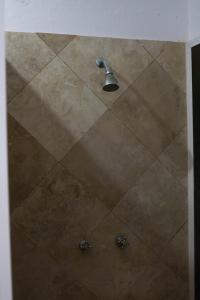 Koupelna v ubytování Departamentos y cabañas a pie de playa -Baraka Beach Club + 144 fotografií