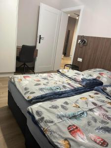 Ένα ή περισσότερα κρεβάτια σε δωμάτιο στο Apartament HALLERA