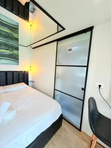 Postel nebo postele na pokoji v ubytování 446 Tiny House Shirokë