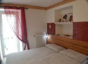 Postel nebo postele na pokoji v ubytování Residence Arvinei